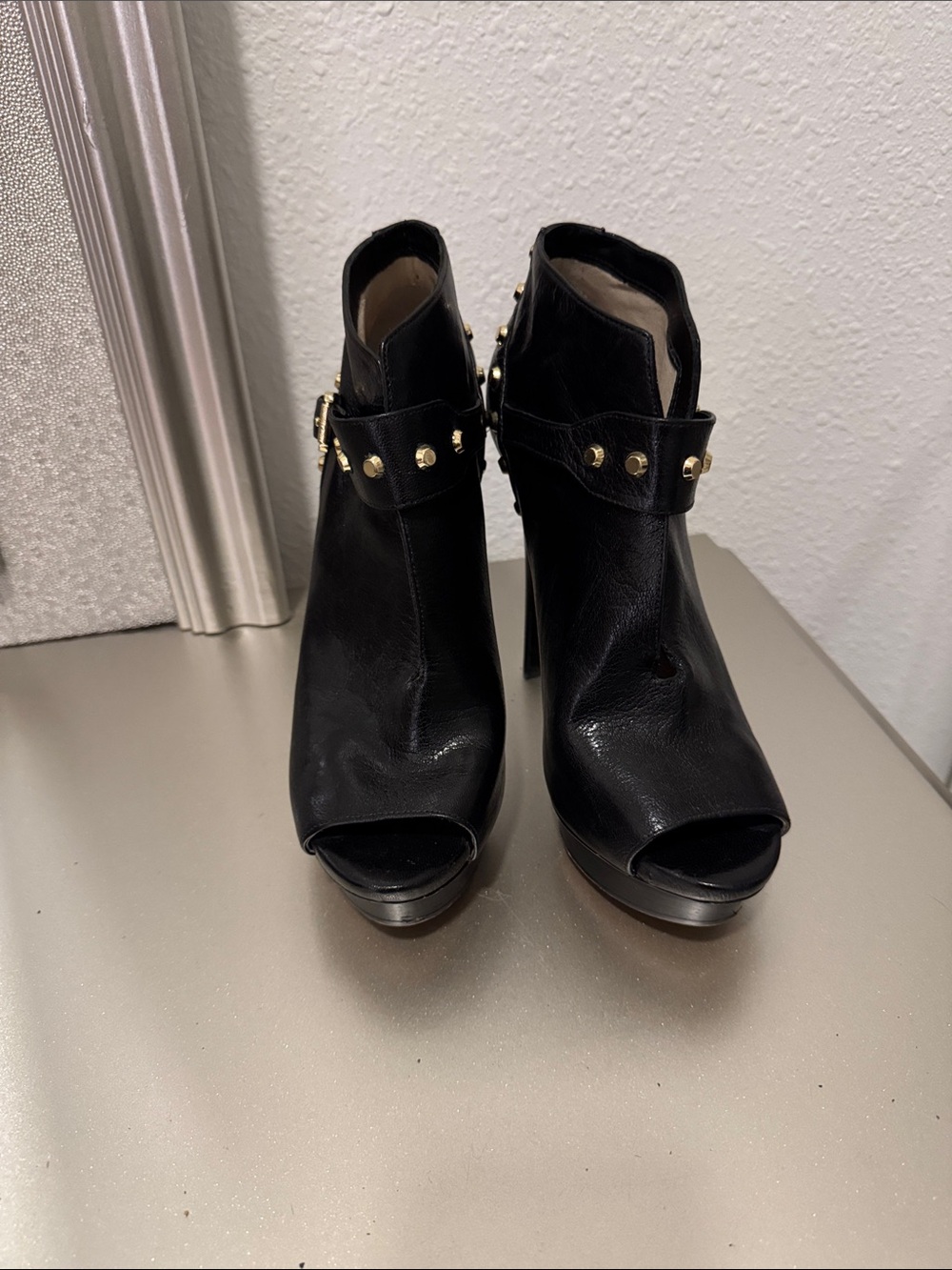 MICHAEL Michael Kors Black Peep-Toe Studded Ankle Booties with Gold Accents